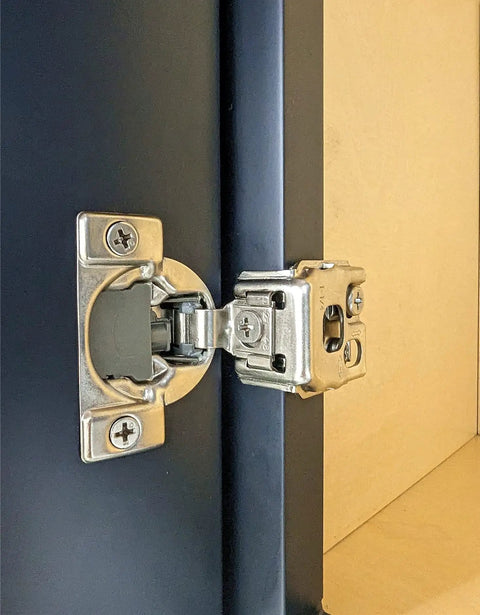 Smooth As Butter Soft Close Cabinet Hinges With 3 Way Cam Adjustment 1 1/4 Overlay And 105 Degree Open heavy-duty nickel hinge detail on dark cabinet