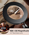 Close-up of Gooseneck Lamp Magnifier With Stand 10x And 5x Zoom, showing 4.3 inch glass lens on wooden surface