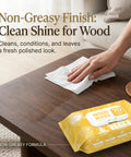 Person using XL Wood Furniture Cleaner Wipes 8X10 Inch 70 Count on a wooden table for a non-greasy shine.