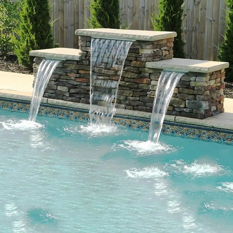 Poolside view with Pond Waterfall Kit With LED Lights And All In One Stainless Steel Spillway, showcasing water streams.