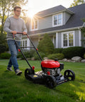 Man using Easy Start 18 Inch Gas Lawn Mower With 144cc OHV Engine Steel Deck Side Discharge 5 Position Height Adjustment Lightweight Walk Behind Push Mower For Small Yards Quick No Fuss Yard Care on lawn.