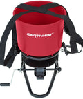 Pro Grade Chest Mount Hand Crank Spreader With Even Spread Technology 40 Lb Hopper, red with adjustable harness and crank handle.
