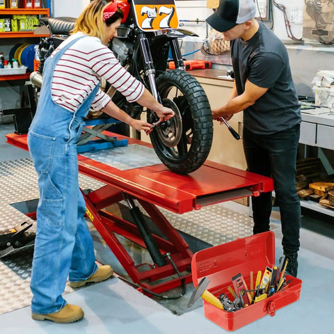 Red Small Metal Tool Box 15 Inch Portable Mini Tool Box With Hip Roof Style Heavy Duty Steel Construction And Corrosion Resistant Powder Coat Finish For Home Garage And On The Go Repairs on workshop floor with tools