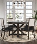 Dining room with Premium Breathable Office Chair Cushion With Non Slip Surface on chairs, round table, and large windows.