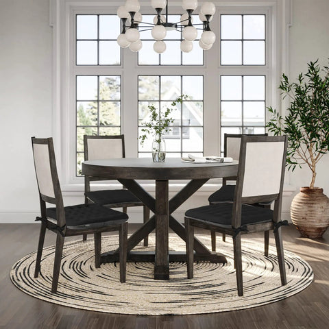 Dining room with Premium Breathable Office Chair Cushion With Non Slip Surface on chairs, round table, and large windows.