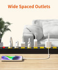 Built Tough Heavy Duty 8 Outlet Power Strip With 2100J Surge Protector, 6 Ft Cord, Wide Spaced Outlets, Wall Mountable Metal Power Strip For Home Office, Garage, And Workshop With Auto Shutdown Fuse on desk