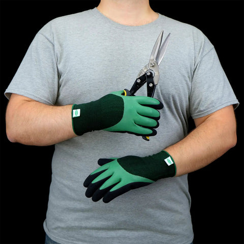 Person wearing Double Dipped Latex Work Gloves With Water Resistance, Super Grip, Abrasion Resistant, Green And Black, holding shears.