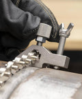 Close-up of Pipe Alignment Chain Pliers Built Tough For Precise Welding, adjustable stainless steel contacts with nickel plated chain.