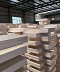 Baltic birch plywood sheets, front view, 1/8 in thick, 11.8x20 in, 20-pack, light wood stacked in warehouse