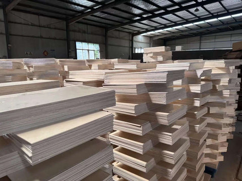 Baltic birch plywood sheets, front view, 1/8 in thick, 11.8x20 in, 20-pack, light wood stacked in warehouse