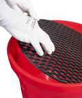 Heavy Duty 50 Lb Broadcast Fertilizer Spreader For Lawns, showing clog-free grate placement in red container