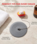 TEHAUX Silicone Bathtub Drain Stopper 6'', Hair Catcher for Bathroom with gray silicone design and stainless steel chain.