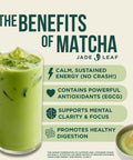 Glass of iced matcha tea with benefits listed and bamboo whisk
