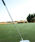 Pro Grade Premium Aluminum Head Putter With Chrome Stepless Shaft Stiff Graphite Build Ergonomic Rubber Grip White Finish High Precision Feel For Consistent Putts On The Green on a golf course