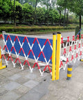 Rock Solid Expandable Safety Fence Gate With Swivel Casters Adjustable Scissor Barricade for blocking off areas at job sites.