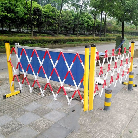 No Fuss Heavy Duty Rolling Scissor Barricade, Expanding Safety Fence Gate With Easy Roll Stoppers, Tough Portable Traffic Control Barrier for job sites, red and white expanding frame.