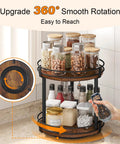 Rotating Spice Rack Two Tier Lazy Susan Organizer featuring brown wood turntable on kitchen countertop with spices and jars