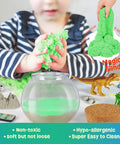Child playing with Dinosaur Terrarium Kit For Kids With LED Night Light And Remote Control DIY Dino Toys Arts And Crafts Set