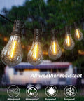 Outdoor LED String Lights 100 Ft Waterproof With 52 Dimmable Edison Bulbs Shatterproof Design glowing in rain