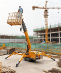 Heavy Duty Small Crawler Crane With Fly Jib And Hydraulic Telescopic Boom raises worker on site, ideal for tight constructions.