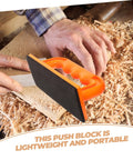 Hands using Safety Push Block for Table Saws and Router Tables Lightweight Portable Orange Woodworking Push Block for Workshops Safer Cuts and Precise Control All Day Performance on wood