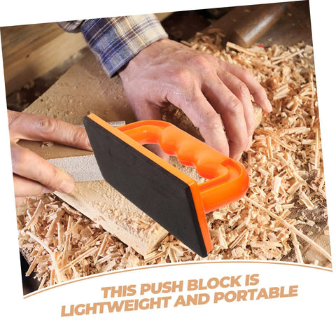 Hands using Safety Push Block for Table Saws and Router Tables Lightweight Portable Orange Woodworking Push Block for Workshops Safer Cuts and Precise Control All Day Performance on wood