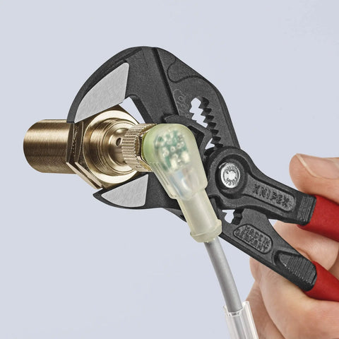 Seven And A Quarter Inch Pliers Wrench With Smooth Jaws And Black Finish, Thirteen Position Adjustable Do It All Gripper in use