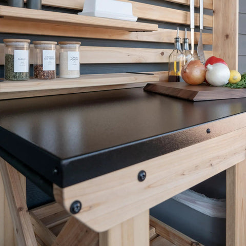 Close-up of 48 Inch Cedar Wood Buffet Hutch Serving Station With Galvanized Steel Countertop, showing spices and cutting board.