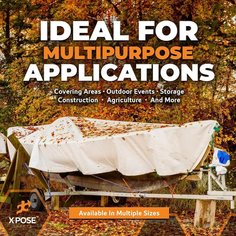 Heavy Duty White Poly Tarp 12 Ft By 16 Ft, Workhorse Multipurpose Cover, protecting a boat in an autumn setting.