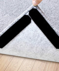 Close-up of Double Sided Non Slip Rug Tape Set 16 Pieces Reusable And Washable Keeps Rugs Flat On Hardwood Tile Carpets Mats And Walls.