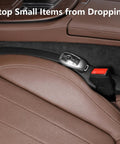 Universal Pu Leather Car Seat Gap Filler 2 Pack Console Crevice Blocker Keeps Phones Keys Wallets Safe Straight Up showing brown leather and key fob.