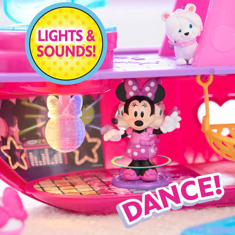 Minnie Mouse Bowdazzling Yacht Lights And Sounds Playset With 16 Piece Figures And Accessories Pink Boat For Kids 3 Years And Up Includes Minnie And Daisy Figures Plus Bonus Crew And Ocean Themed Fun showing Minnie dancing on the yacht.