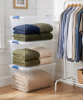 Hella Tough 66 Quart Clear Plastic Storage Bins With Secure Twist Latches And Smart Stack Design, holding folded blankets.
