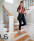 Woman on wooden stairs with Clear No Slip Stair Treads For Indoors Anti Slip Tape For Wood Floors Easy Peel And Stick Grips.