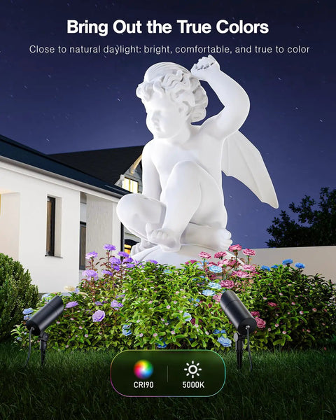 Two Pack Ultra Bright 30W Outdoor LED Spotlight Set, 120V, 3000 Lumens Each, 5000K Daylight, illuminating a garden statue.