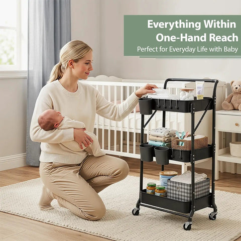 Woman using 3 Tier Foldable Rolling Cart With Wheels Grab-And-Go Space Saving Utility Organizer with baby items in nursery.