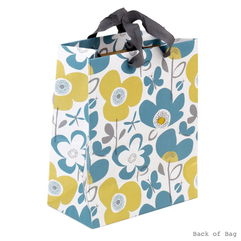 Medium Gift Bag With Tissue Paper Flowers And Butterflies In Turquoise And Yellow For Birthdays Mothers Day Bridal Showers Baby Showers And More Great For Gifting For Candles Books Scarves Or Small Gifts, back view showing floral pattern.