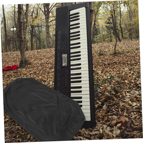 Stretchable Electronic Piano Keyboard Cover With Drawstring Key Protector placed by a 61-key digital piano outdoors.