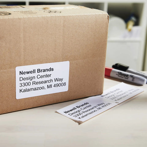 Heavy Duty Shipping Labels With Sleek Peel Off Backing Drop Right On Parcels For Instant Prep Works Dead Simple With Labelwriter Printers Using Direct Thermal Tech To Dodge Ink Bills Captures Six Line Addresses On Popular 2 5 16 By 4 Inch Rolls Holding on cardboard box.