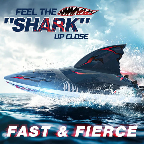 Fast Brushless RC Boat For Adults With Self Righting Hull cutting through water, realistic fins visible, LED lights on.