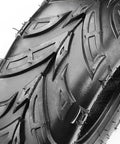 Close-up of tread pattern on Tubeless 145 70 6 Tire Set For Coleman PowerSports Mini Bikes Go Karts ATVs And Four Wheelers 2 Pack