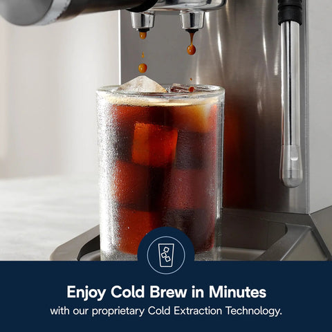 Dedica Duo Compact Espresso Machine With Milk Frother Wand for Espresso Cold Brew dispensing iced coffee into a glass