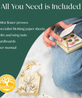 Person holding Ultra Portable 3x3 Inch Flower Press Kit Two Pack For Adults with pressed flowers on top, showing contents.