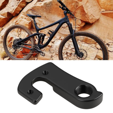 Two Pack Bike Derailleur Hanger With Screw 959371-8-5 replacement part with a black metal derailleur hanger in front of a mountain bike
