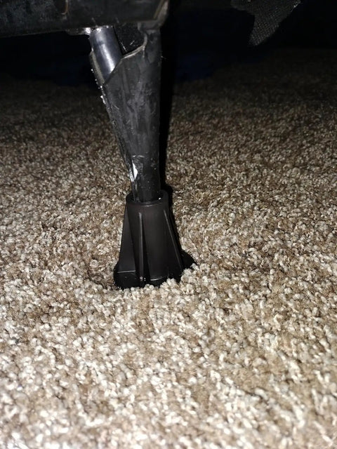 Steel Stem Bed Frame Feet Replacement Set Of 4 With Plastic Inserts To Stop Sliding And Replace Wheels installed on carpet floor