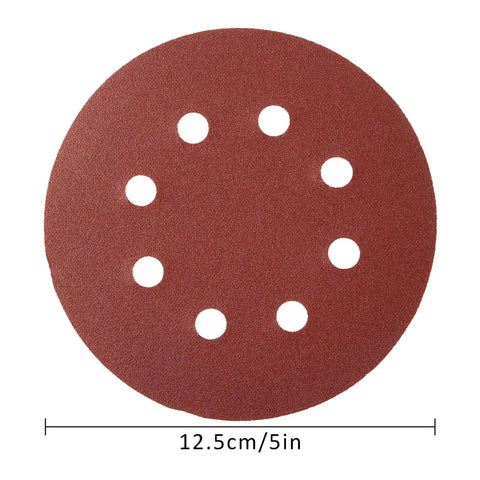 Awesome 100 Piece Sandpaper Set With 125Mm Hook Loop Discs Ranging From Rough 80 Grit To Ultra Smooth 3000 Grit showing a 125mm sanding disc with vacuum holes.