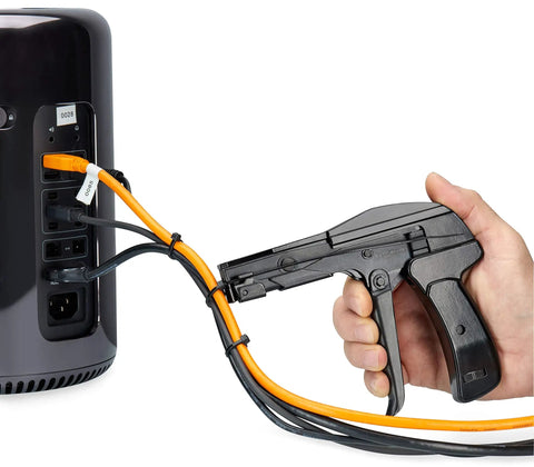 Hand using Zip Tie Gun And Cable Tie Install Tool With Adjustable Tension No Fuss Built In Cutter for cable management on a device.