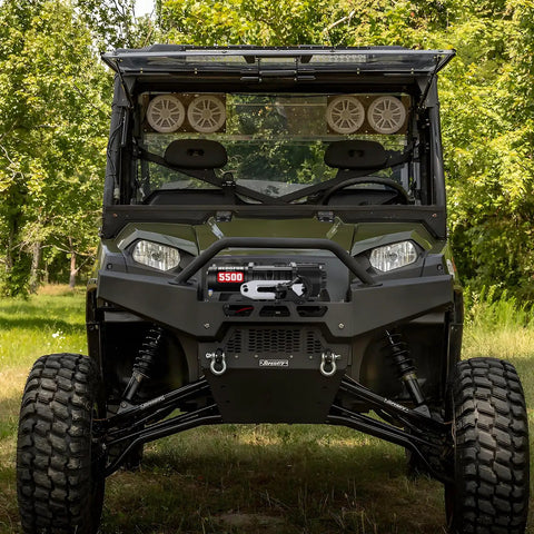 Heavy Duty 5500 Lb Electric Winch For Atv Utv With 12 Volt Motor and Waterproof Design mounted on ATV with mud tires.