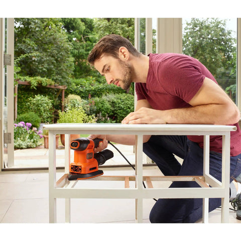 Pick Up This Bad Boy Heavy Duty Multi Sander With 200 Watt Motor, 4 In 1 Orbital And Finger Sanding Heads, Dust Free Power Tool For Quick Smooth Wood Finishes Worth Every Penny, man using sander on table.