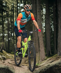Cyclist on 26 Inch Mountain Bike For Men And Women Of All Ages With 7 Speed Drivetrain, Aviation Grade High Carbon Steel Frame, trail ride